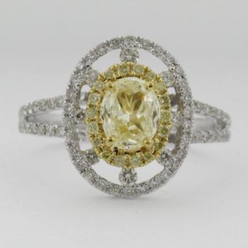 Fancy Yellow Oval Shape Diamond Halo Ring set in 18kt White and Yellow Gold /SER17793Y