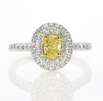 Oval Shape Fancy Yellow Diamond Double Halo Diamond Ring set in 18kt White and Yellow Gold /SER19733AY