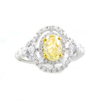 Fancy Yellow Oval Shape Diamond Double Halo Ring set in 18kt White and Yellow Gold /SER16473Y
