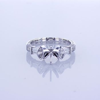 0.32 14K WHITE GOLD BAGUETTE AND ROUND CUT ENGAGEMENT SETTING WITH ACCENT DIAMONDS ON EACH SIDE 009426