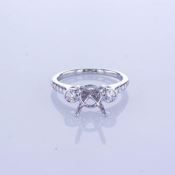 0.36CT 18KT WHITE GOLD THREE STONE DIAMOND ENGAGEMENT RING WITH BEZEL SET AND PAVE DIAMONDS ON THE SHANK 010646
