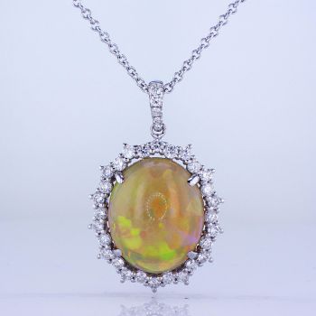 8.49CT 18KT WHITE GOLD OVAL SHAPED OPAL PENDANT WITH ROUND DIAMONDS IN A HALO 016759