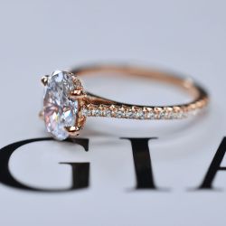 14Kt Rose gold engagement ring setting with diamond accents